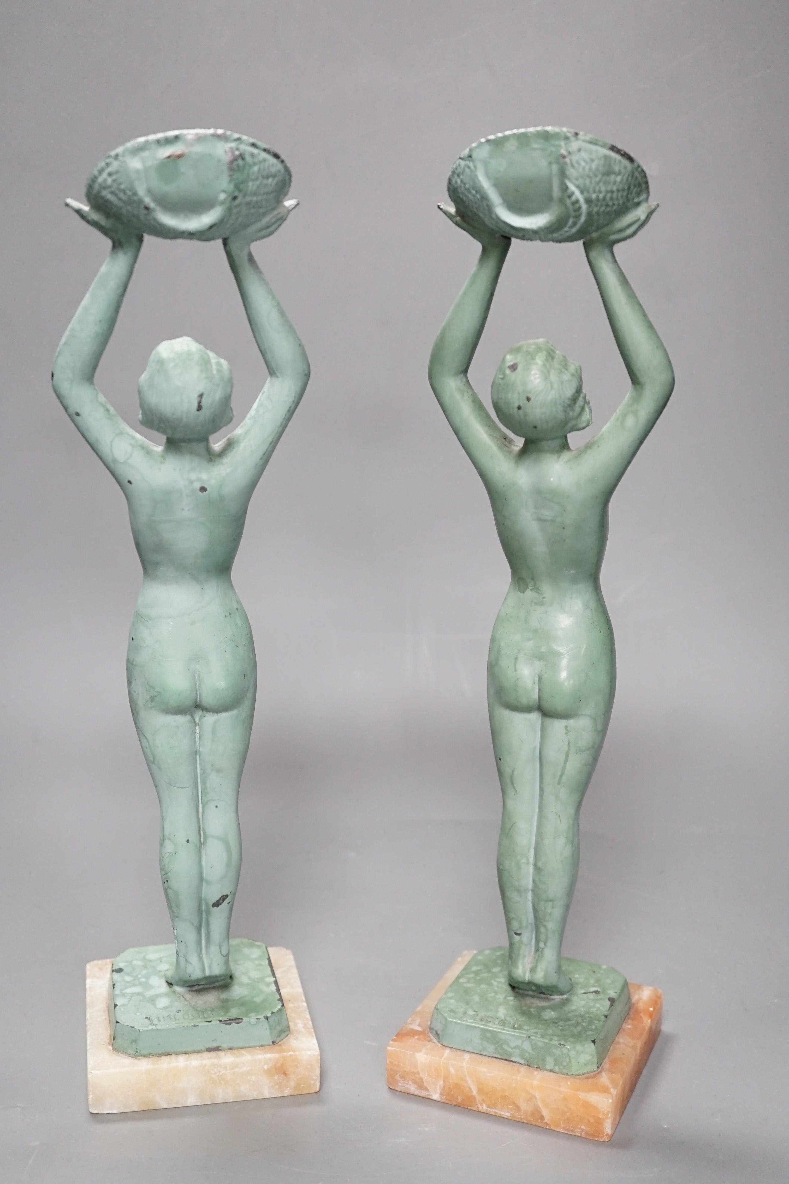 A pair of Art Deco bronzed metal figures stamped ‘Limousin’, 37cm